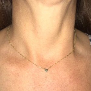 Gold heart shaped dainty necklace.
